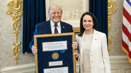 Venezuelan Nobel winner gifts her medal to Trump