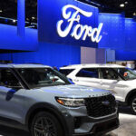American auto giant reports record losses