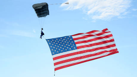 American flag skydiver crashes into beer tent (VIDEO)