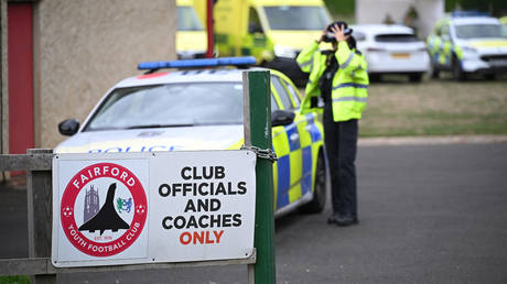 UK police arrest five men amid bomb alert outside US air base